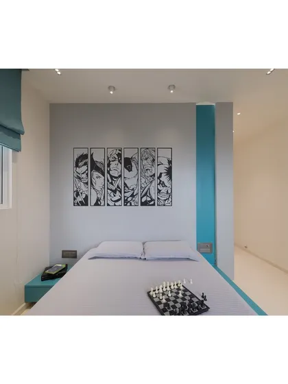 For the kid's room in the Fluted House, I used a palette of muted teal and grey, complemented by monochrome superhero graphics. This approach creates a youthful, contemporary style that is fun and inspiring without being overwhelming.