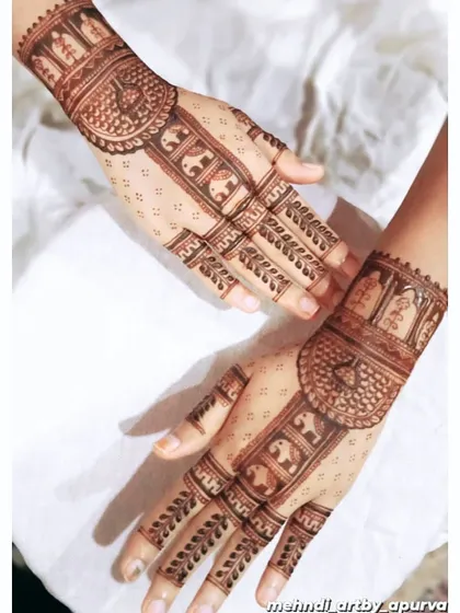 This pose shows the simple elephant design from a different angle. The clean lines and spacing make the motifs stand out, perfect for someone who wants a traditional but not overly dense pattern.