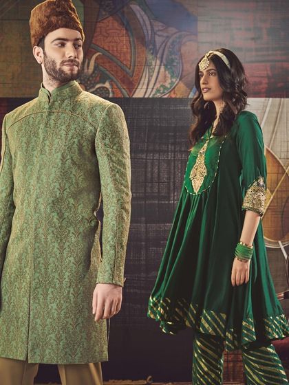 The essence of timeless tradition. This campaign image showcases a groom in a regal green sherwani with a traditional cap, embodying heritage and style.