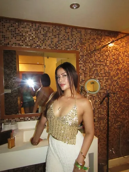 A front view of the glamorous gold and white co-ord, perfect for a party.