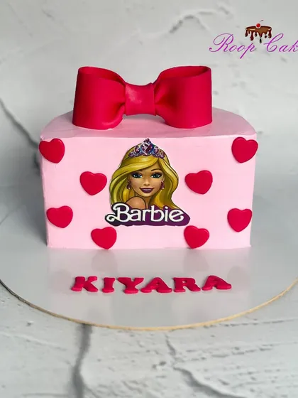 A half-birthday Barbie theme cake, perfect for a little one who is six months old and already a star.