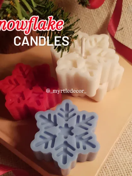 A trio of our Snowflake Candles in red, white, and blue. We love grouping them together to create a small, festive cluster on a mantelpiece or side table.