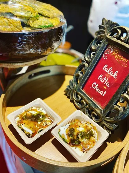 A modern take on a classic favorite. Our Palak Patta Chaat, served in individual portions, is a perfect example of how we blend traditional Indian flavors with contemporary presentation for corporate gatherings.