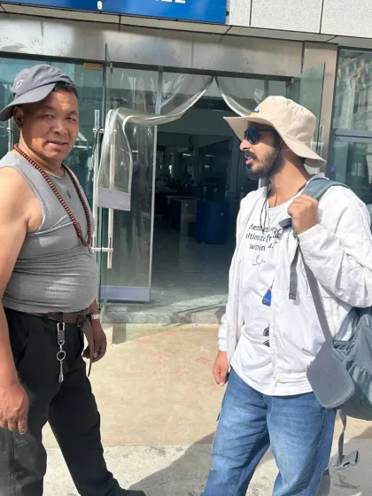 Interacting with our local Tibetan guide. Their knowledge and reverence for the land are an invaluable part of our journey.