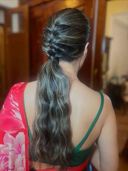Another angle of the braided ponytail, showing the beautiful texture of the braid and the waves.