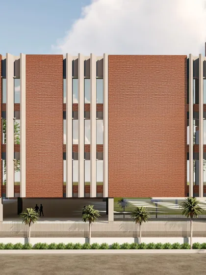 This is a rendering of an industrial unit designed for green certification. We've used vertical louvers to shield the west-facing facade from harsh sun, reducing cooling costs, while the combination of insulated walls and optimized windows ensures energy efficiency year-round.