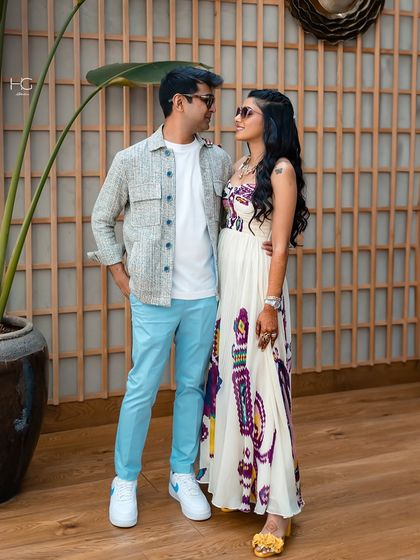 Shrey Sancheti effortlessly nailing the casual festive look. A simple shacket over a white tee and bright trousers is perfect for a relaxed Mehendi or welcome brunch.