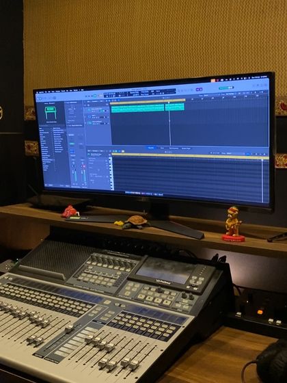 A moody shot of the studio mixing board and monitor late at night. A lot of my creative work happens in these quiet, focused moments.