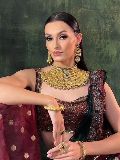 A powerful portrait from the campaign. The model's sharp features are enhanced with contouring and a defined eye, creating a striking and memorable image.