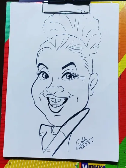 Another example for those who want to learn how to draw caricatures. This one has a fun, messy bun.