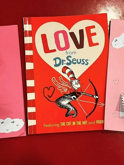 "There is no friend as loyal as a book." For Valentine's Day, we combined our love for reading with a fun card-making activity inspired by Dr. Seuss.