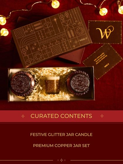 The "Corporate Mini" is a budget-friendly yet elegant option for Diwali gifting. It features premium copper jars and a festive glitter jar candle to thank your team and clients.