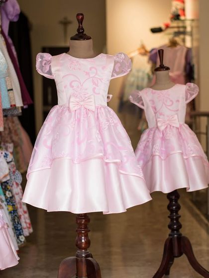 Another look at these beautiful matching pink organza dresses on display. They are a perfect example of how I can create identical looks for siblings of different ages.