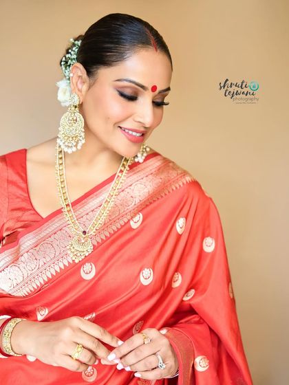 An elegant portrait of Bipasha Basu during her daughter's 'Annaprashan' ceremony. I specialize in capturing the grace of traditional family events with a fine art touch.