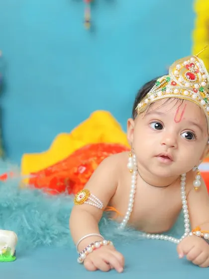 A slightly different angle, capturing the baby's wide-eyed wonder.