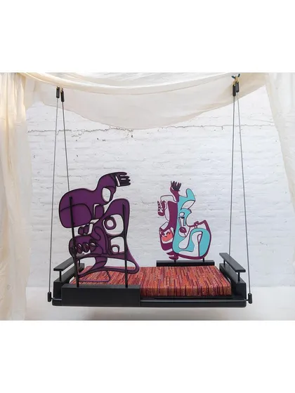 The swing configured for a different kind of lounging, showcasing its versatility as a piece of interactive art furniture.