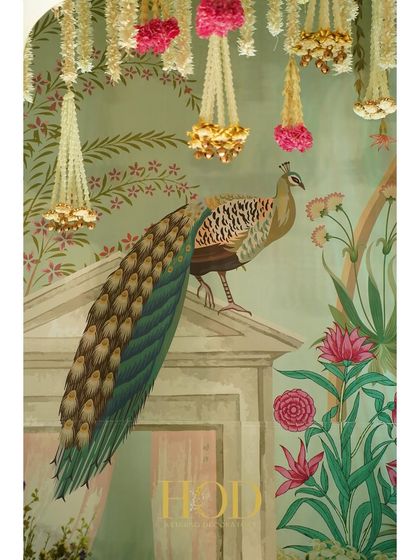A close-up of a beautiful Pichwai-style painting of a peacock, used as a backdrop and complemented by hanging floral strings.