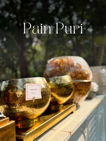 No Indian wedding is complete without a Pani Puri counter. My setup features large golden bowls for the fillings and water, with a mountain of crispy puris ready to be devoured.