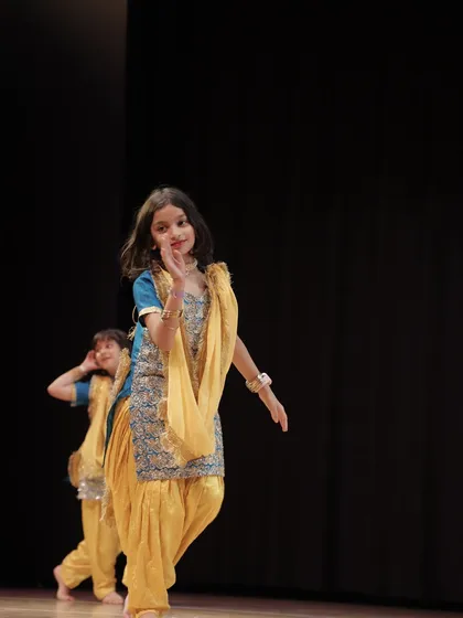 A candid moment of one of our youngest dancers on stage. Her smile says it all. Maza aaya sabhi ko!