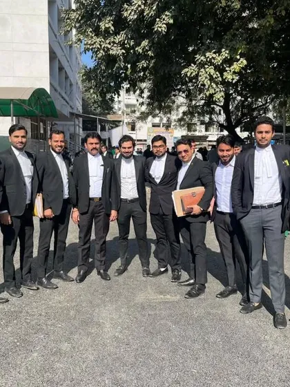 A group of us outside the court building. We often appear in court together to support each other during hearings.
