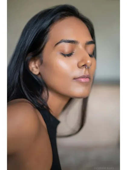 Serenity in a single moment. A close-up portrait capturing a feeling of peace and calm, with beautiful, natural-looking skin tones.