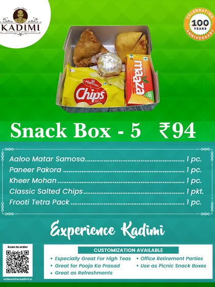 Snack Box 5 comes with an Aloo Matar Samosa, Paneer Pakora, Kheer Mohan, chips, and a drink.
