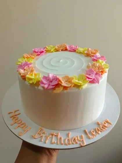 Another angle of the bright and happy floral birthday cake.