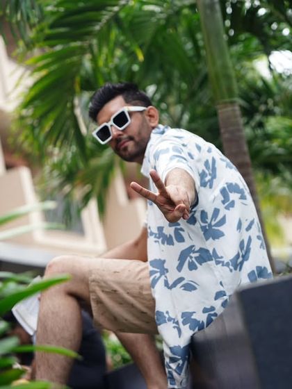 A fun, casual pose that reflects the vibe of a destination wedding's daytime event.