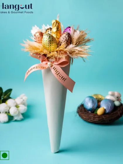 My Easter Egg Blossom Bouquet is a unique way to gift chocolates. This cone-shaped bouquet is filled with rich chocolate eggs and accented with dried florals for a beautiful and delicious treat.
