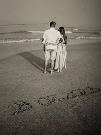 A creative 'save the date' shot for Milando and Joann, with their wedding date written in the sand. This is a simple yet effective way to announce your day.