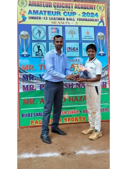 Pranav Naik, who took the first-ever hat-trick in the Amateur Cup, receiving the Best Bowler of the Tournament award.
