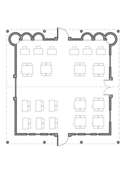The floor plan for the Spastic Society classroom, showing the simple, open layout designed for wheelchair accessibility. The buttressed walls create alcoves and add stability to the mud block structure.