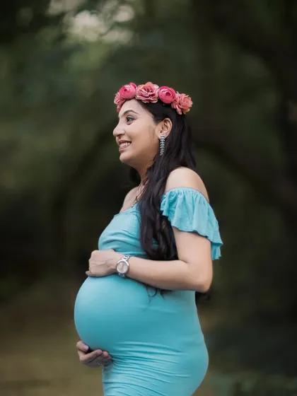 A duplicate of 79, this profile shot beautifully captures the joy and anticipation of motherhood.