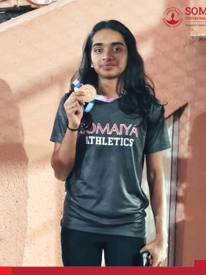 Swanandi Sawant with her gold medal won for the 400m Hurdles at the state school games athletics meet.