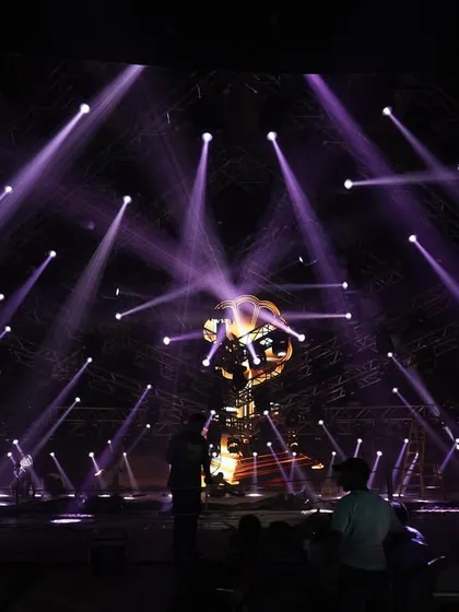The 'Po Po' song set during a lighting check, with purple beams creating a dramatic web of light.