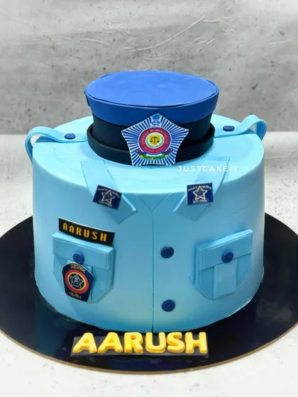A cake designed as a Mumbai Police uniform for a little boy who admires them. It was an honor to create a cake that represents so much pride and respect.