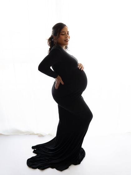 A black gown can be so incredibly elegant and powerful for a maternity shoot. This silhouette shot highlights the beautiful curves of pregnancy in a classic and sophisticated way.