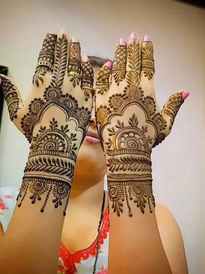 Another shot of the mandala back-of-hand design, a timeless and beautiful choice for any occasion.