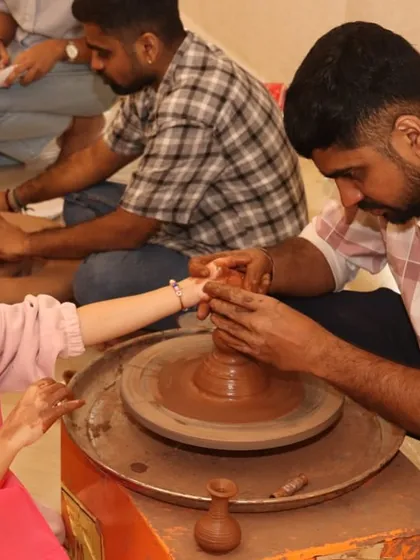 Learning together is the best kind of fun. Our parent-child workshops, like this pottery session, are designed for families to connect, create, and get their hands dirty while exploring the science of materials and motion.