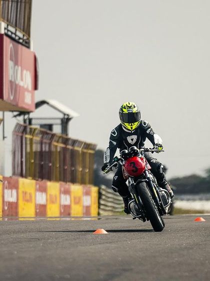 Another angle of our counter-steering drill, where riders learn to push the handlebar in the opposite direction of the turn to initiate a lean.