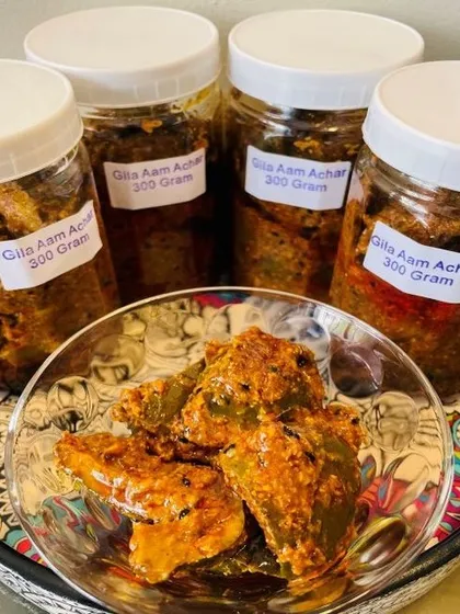 A closer look at my spicy Gila Aam Achar. You can see the chunks of raw mango coated in a thick, flavorful masala. I prepare this to have the perfect tangy and spicy balance that goes so well with Indian meals.