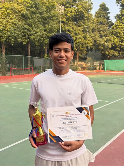 The result of pure heart and discipline. Lokesh proudly displays his trophy and certificate after reaching the Men’s One Lac Tournament Final in Noida.