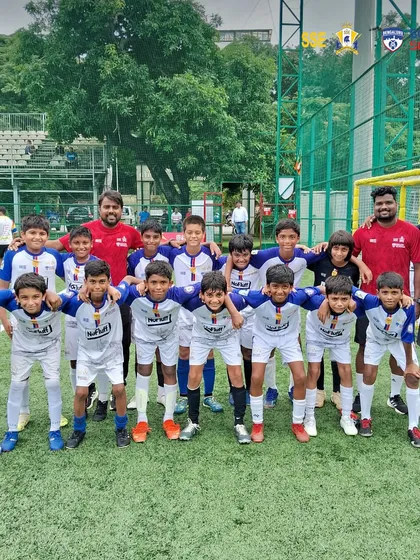 Our U13 players and coaches together, showcasing the strong bond within our academy. We believe in developing and supporting each other through good and tough moments.