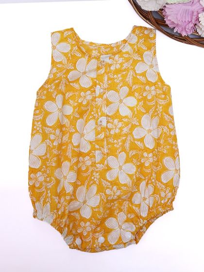 What does yellow mean to you? To me, it's happiness, like this sunny yellow floral romper for babies.