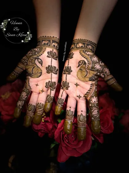 A classic design celebrating traditional Indian motifs. Here, I've featured graceful peacocks and sacred lotus flowers, symbols of beauty and purity, making it a perfect choice for festive occasions like Karva Chauth or Eid.