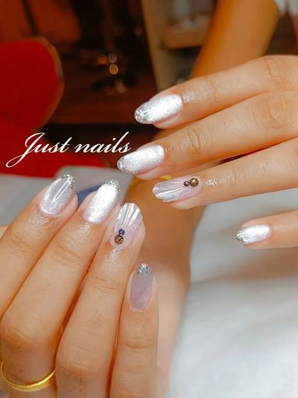 A full view of the beautiful and unique mermaid-inspired nail art.