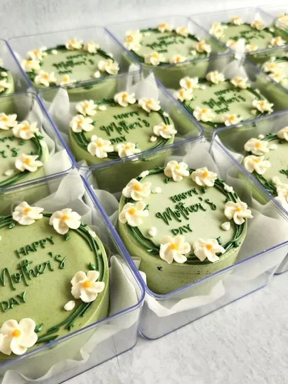 The full set of Mother's Day bento cakes, looking fresh and pretty in their clear boxes.