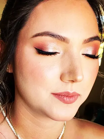This client wanted a natural look where her skin still looked like skin. I used earthy tones and a light hand to enhance her features for a beautiful, subtle result.