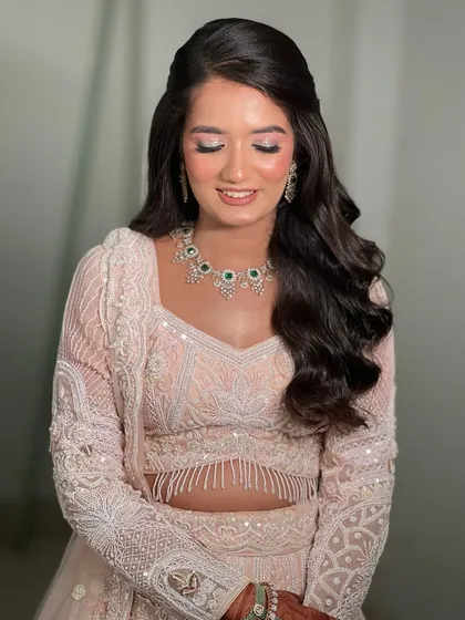 A close-up of the makeup, with eyes closed to show the delicate pink eyeshadow.