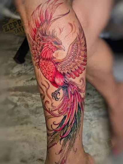 A phoenix represents rebirth and resilience, and I used a vibrant red and orange palette to bring that fiery energy to life. This watercolor style tattoo was designed to flow with the calf muscle, making the phoenix appear as if it's rising in motion.